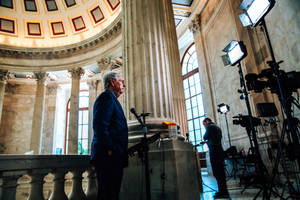 Senator Mitch Mcconnell Engrossed In An Interview Wallpaper