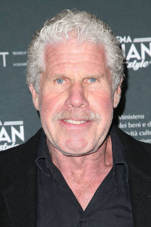 Senior Ron Perlman In Black Wallpaper