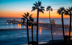 Serene Afternoon On Malibu Beach Wallpaper