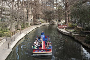 Serene Boat Tour On The San Antonio River Walk Wallpaper