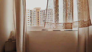 Serenity At Home: Beige Aesthetic Desktop With Open Curtain View Wallpaper