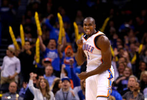 Serge Ibaka With Cheering Fans Wallpaper