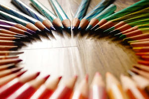 Sharp Colored Pencils In Circular Design Wallpaper