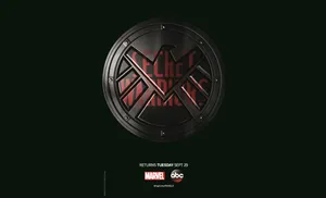 Shield With Lion Emblem On Blue Background Wallpaper