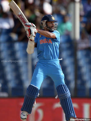 Shikhar Dhawan Striking Stance Wallpaper