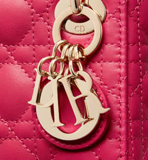 Shine In Style With Pink Dior Wallpaper