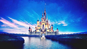 Shining Disneyland Castle And Lake Wallpaper