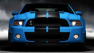 Shiny Blue Car Ready To Ride Wallpaper