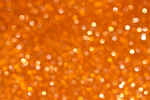 Shiny Orange Bokeh Wallpaper
