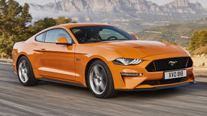 Shiny Orange Mustang Wallpaper