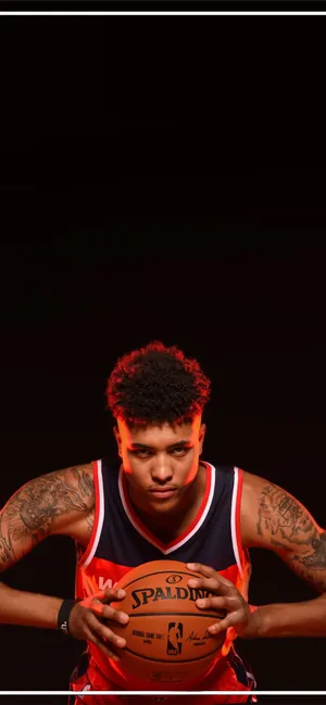 Shooting Guard Devin Booker Showcasing The New Iphone Wallpaper