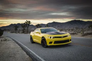 Show Off Your Style With This Sleek And Stylish Cool Camaro. Wallpaper