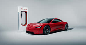 Showcase Of Sophistication And Power - The Tesla Roadster Wallpaper