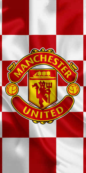 Showcase Your Love For Football With This Red Hot Manchester United Iphone Wallpaper Wallpaper