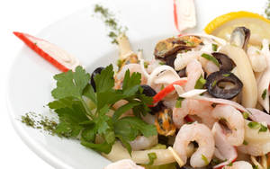 Shrimp Ceviche Garnished With Olives And Coriander Wallpaper