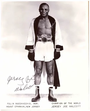 Signed Photo Of Jersey Joe Walcott Winning A World Title Wallpaper