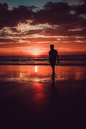 Silhouette Man With Red Sky Wallpaper