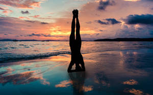 Silhouette Yoga Pose In Beach Wallpaper