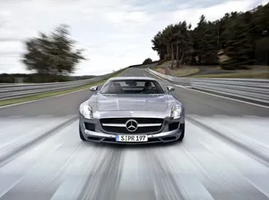 Silver Benz 4k On The Road Wallpaper