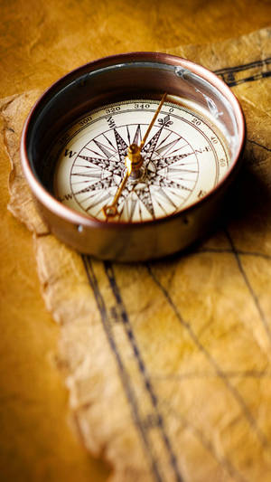 Silver Compass On Ephemeral Paper Wallpaper