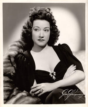 Singer Ethel Merman In Black Portrait Wallpaper