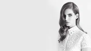 Singer Lana Del Rey Performing Live On Stage Wallpaper