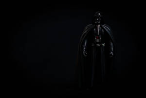 Sith Lord Darth Vader Looms In The Darkness Wallpaper