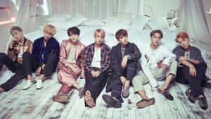 Sitting By The Bed Bts Group Aesthetic Shot Wallpaper
