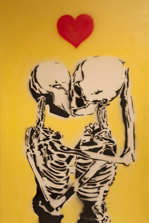 Skeleton Love Kissing Under A Heart Wallpaper