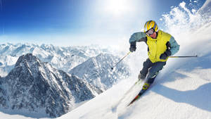 Skiing Over The Mountains Wallpaper