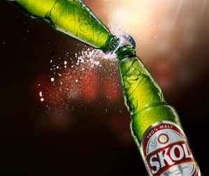 Skol Beer Bottle Splash Wallpaper