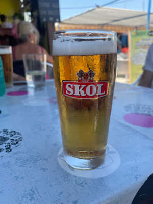 Skol Beer Glasson Table Wallpaper