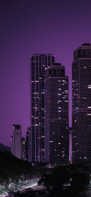 Skyscrapers With Dark Purple Sky Wallpaper