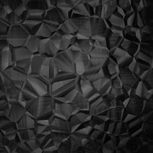 Sleek Black Ipad Displaying Abstract Checkered Patterns Wallpaper
