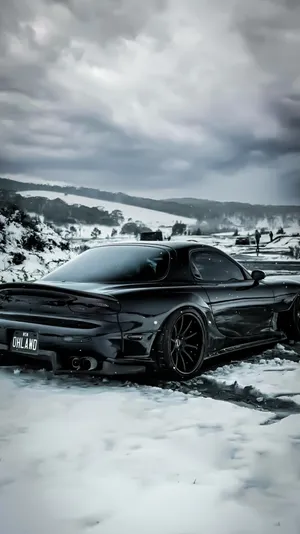 Sleek Black Mazda Rx7 Car Wallpaper