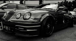 Sleek_ Black_ Sports_ Car_ Monochrome Wallpaper