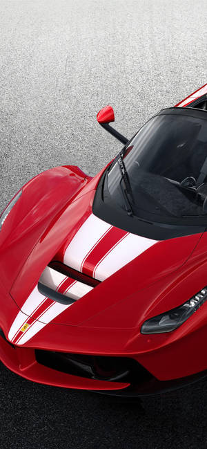 Sleek Ferrari Phone Showcasing Elegance Wallpaper