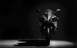 Sleek Motorcycle Dramatic Lighting Wallpaper