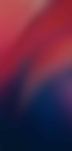 Sleek Redmi 9 With Red Blue Gradient Blur Wallpaper