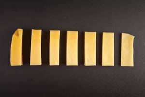 Sliced Cheese Blocks Wallpaper