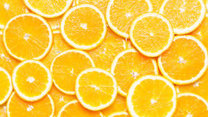 Slices Of Orange Fruit Wallpaper