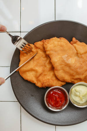 Slicing Wiener Schnitzel Wallpaper