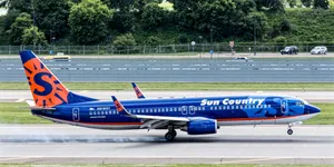 Slick Aviation Takeoff Of Sun Country Aircraft Wallpaper