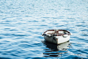 Small White Wooden Boat Wallpaper