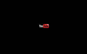 Small Youtube Logo On Black Background Wallpaper