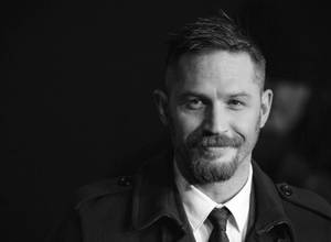 Smiling Actor Tom Hardy Wallpaper