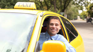 Smiling Male Taxi Driver Wallpaper