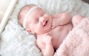 Smiling Newborn Baby Wallpaper