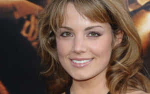Smiling Woman At Event Erica Durance Wallpaper