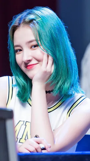 Smiling Womanwith Teal Hair Wallpaper